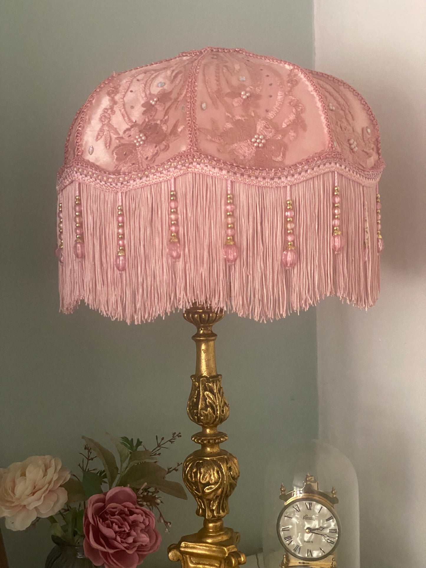 Full view – “Handmade pink Victorian silk lampshade overlaid with floral silk and adorned with sparkling diamantes, finished with pink fringe and pink beaded trim – romantic vintage lighting.”closer view
