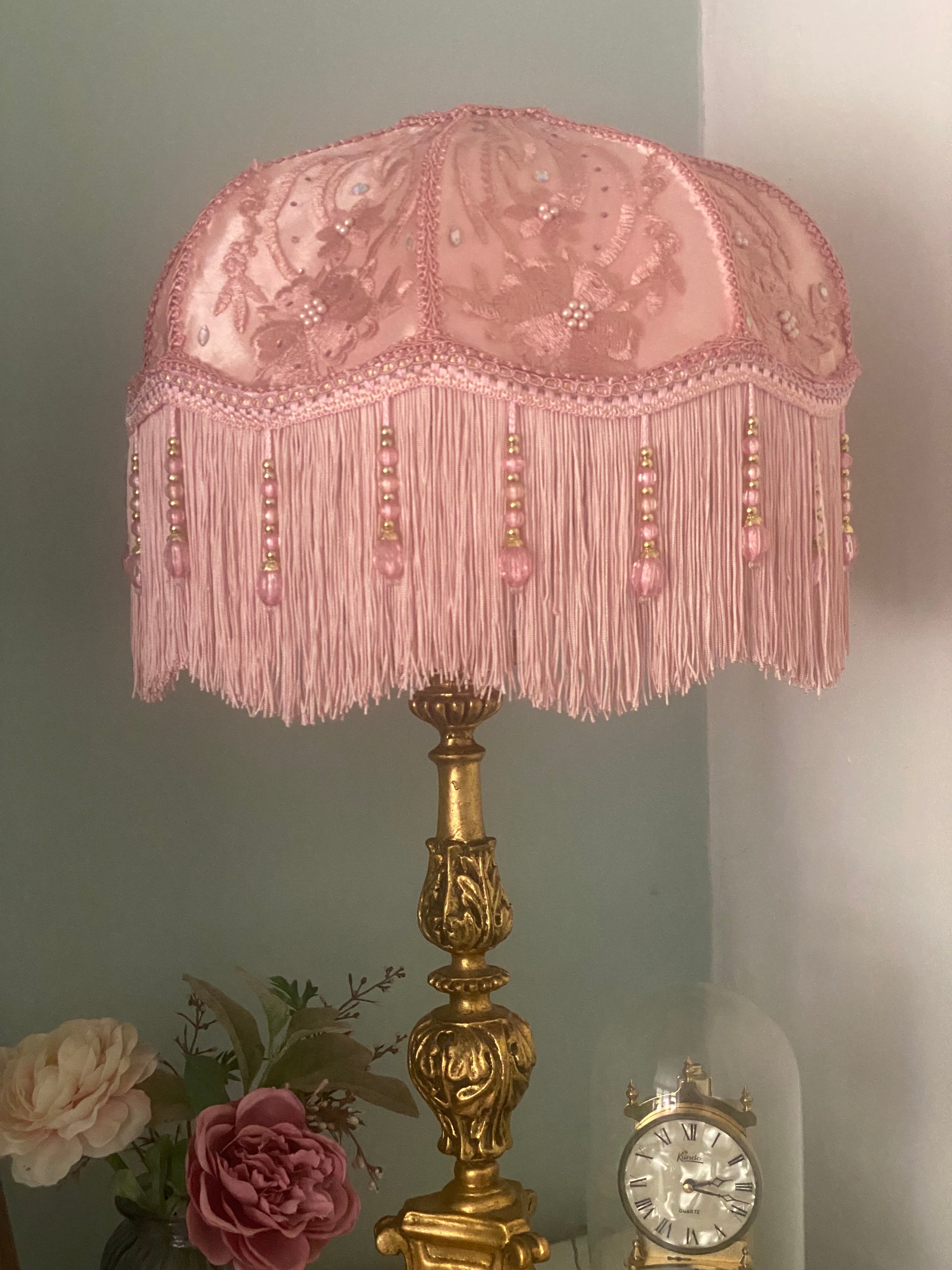 Full view – “Handmade pink Victorian silk lampshade overlaid with floral silk and adorned with sparkling diamantes, finished with pink fringe and pink beaded trim – romantic vintage lighting.”closer view